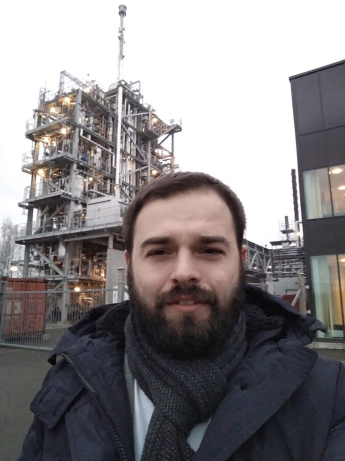 Andrew Rogala in front of a process plant